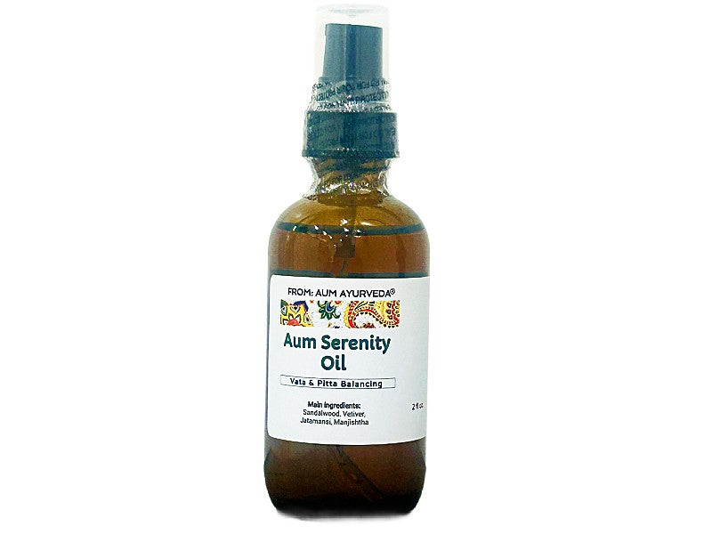 Bottle of Aum Serenity Oil with a white label on a white background, de-stress oil